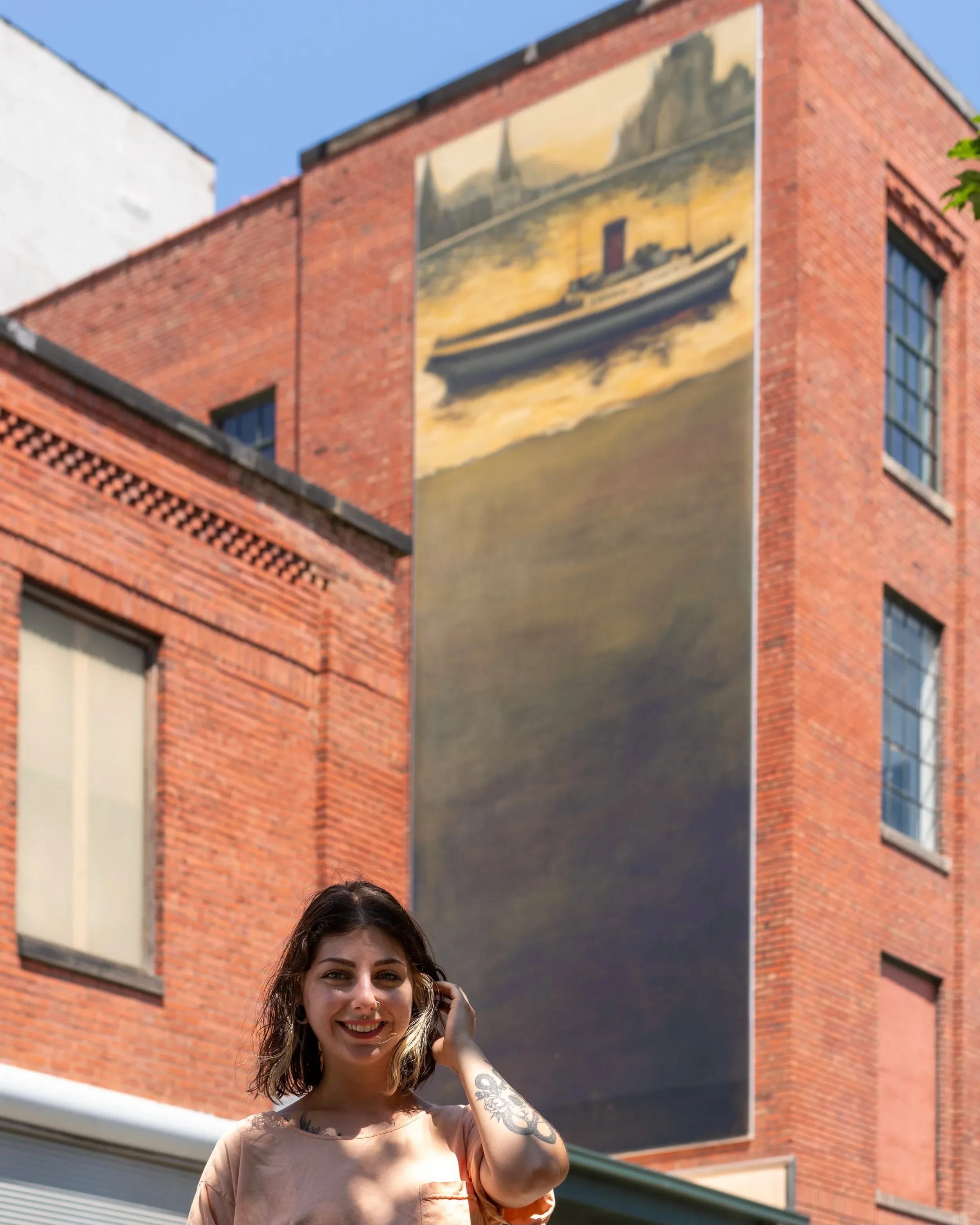 Elizabeth with her mural “Motherland.”