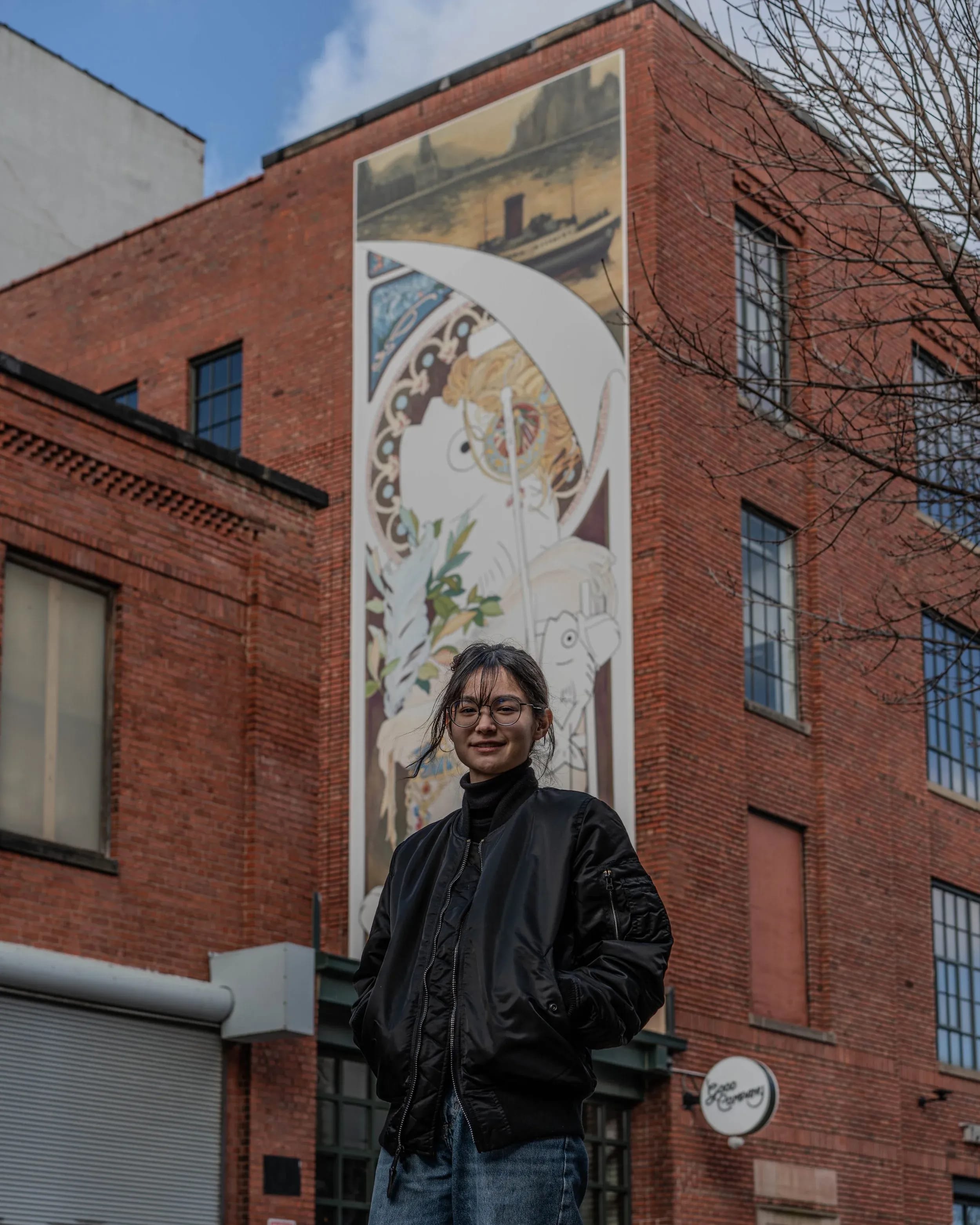 Sakurako with her mural titled The life isn’t gonna imitate the art on its own.