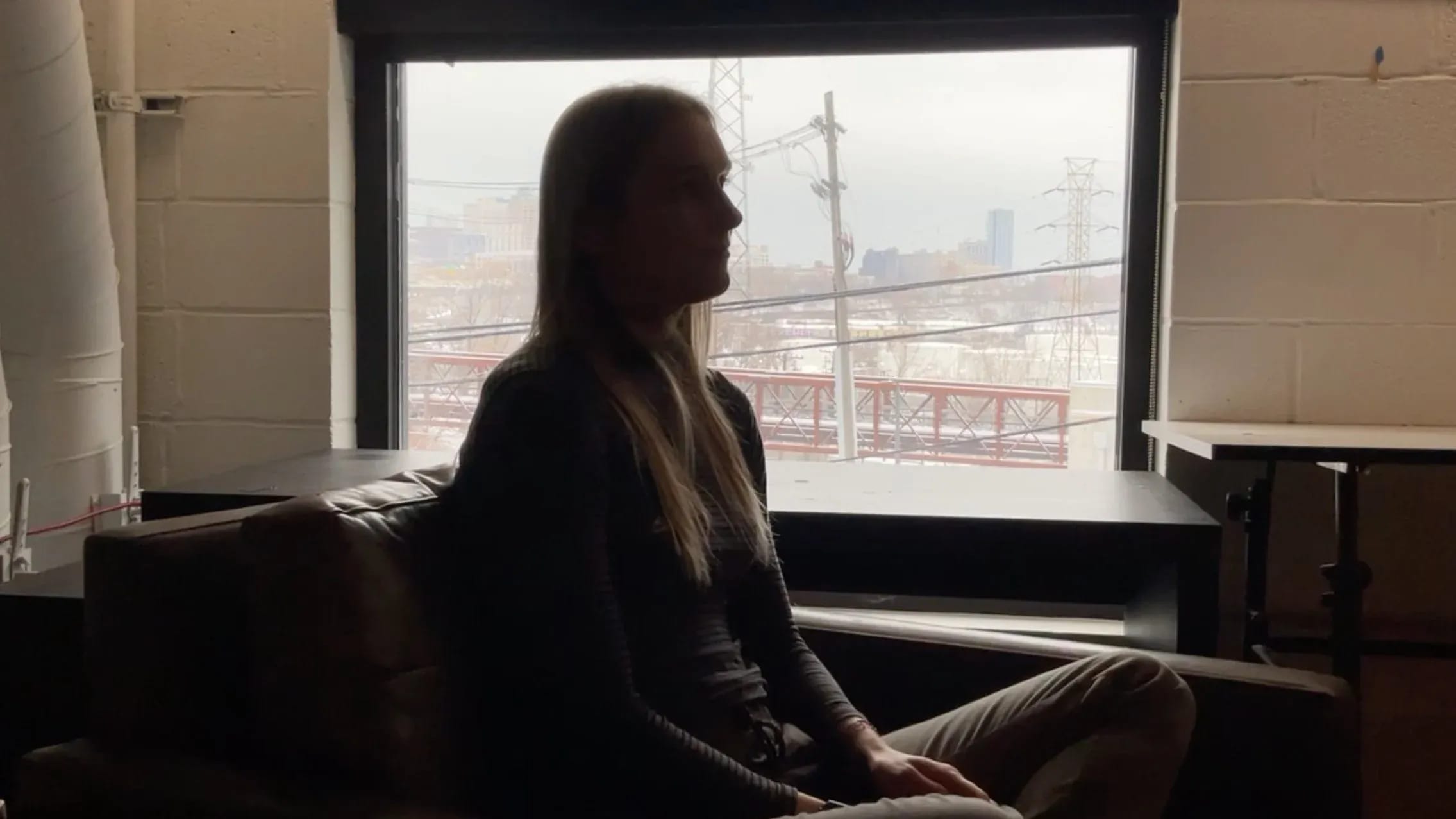 Jules in her interview at the studio.